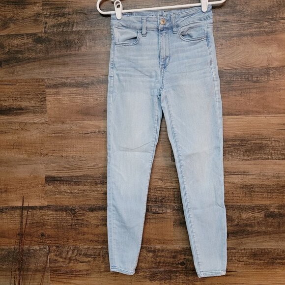 American Eagle Jeans 2s Jegging Next Level Stretch Hi Rise Light Wash Ripped - Picture 1 of 13